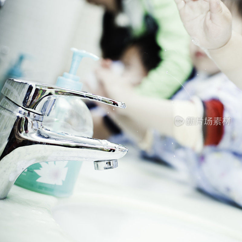 children are washing hands in preschool